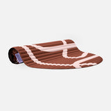 Tapis de sol pour le fitness le yoga et le pilates de la marque hercule studio modèle archy couleur imprimé bari choco packshot semi roulé