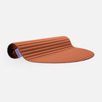 Tapis de sol pour le fitness le yoga et le pilates de la marque hercule studio modèle archy couleur terre cuite packshot semi roulé