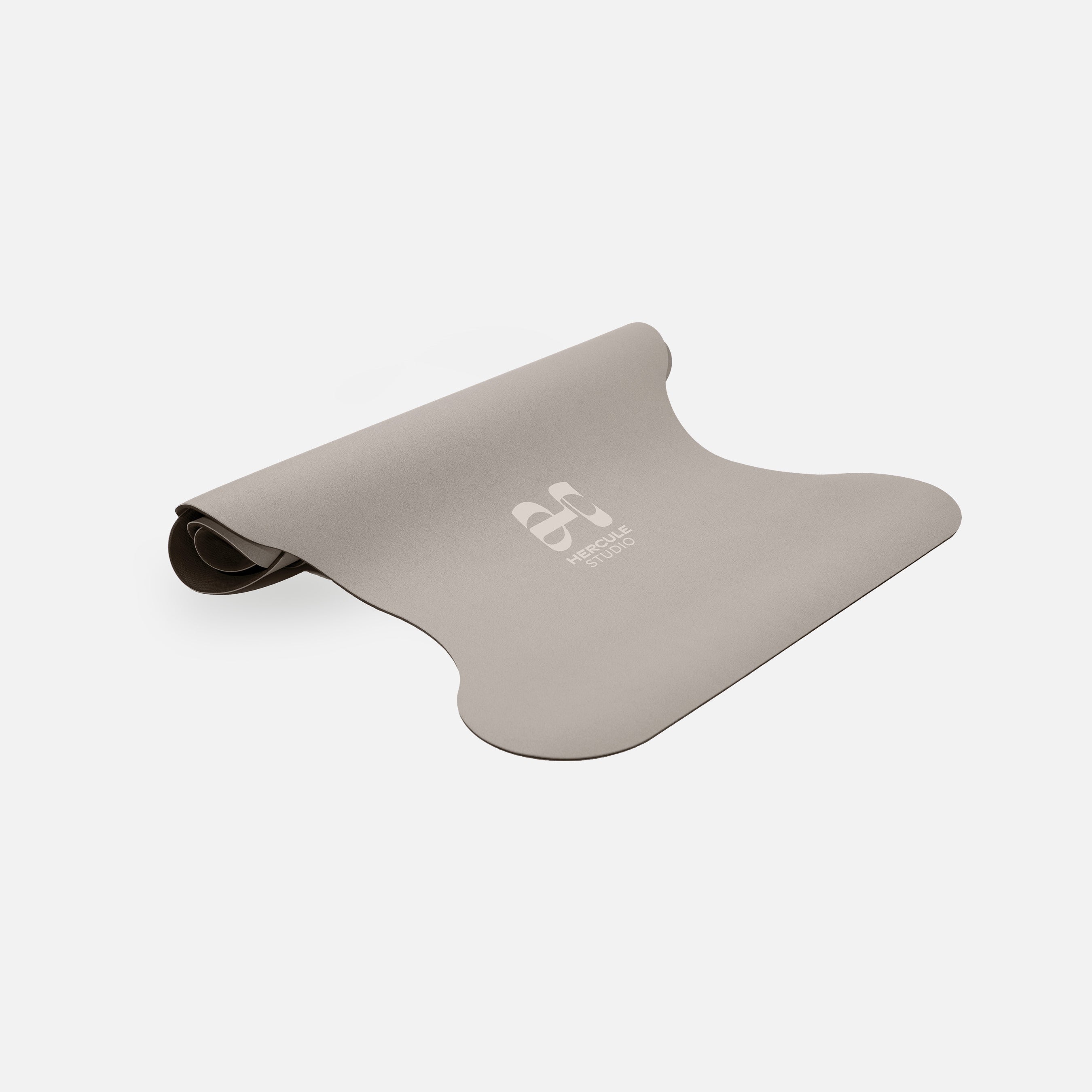 Tapis de sol pour le yoga de la marque hercule studio modèle mar couleur greige packshot semi roulé