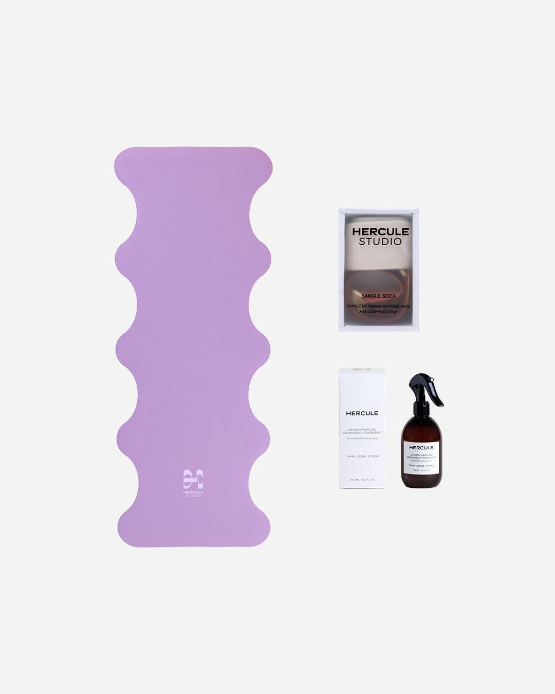 Tapis de sol pour le yoga de la marque hercule studio modèle mar couleur lavande et sangle de transport pour tapis de sport et spray parfumé énergisant pour tapis de sport packshot global