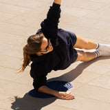 Yoga session with the Hercule Studio Galé navy comfort pad, elegant design for knees and elbows, durable mini mat made in France