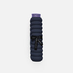 Hercule Studio Galé pad – navy blue portable 3-in-1 mini mat – convenient for transport and travel, suitable for Pilates/Reformer, durable French design, rolled view with logo ribbon