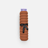 Mini tapis de sol pad de confort de la marque hercule studio modèle galé couleur terre cuite packshot roulé