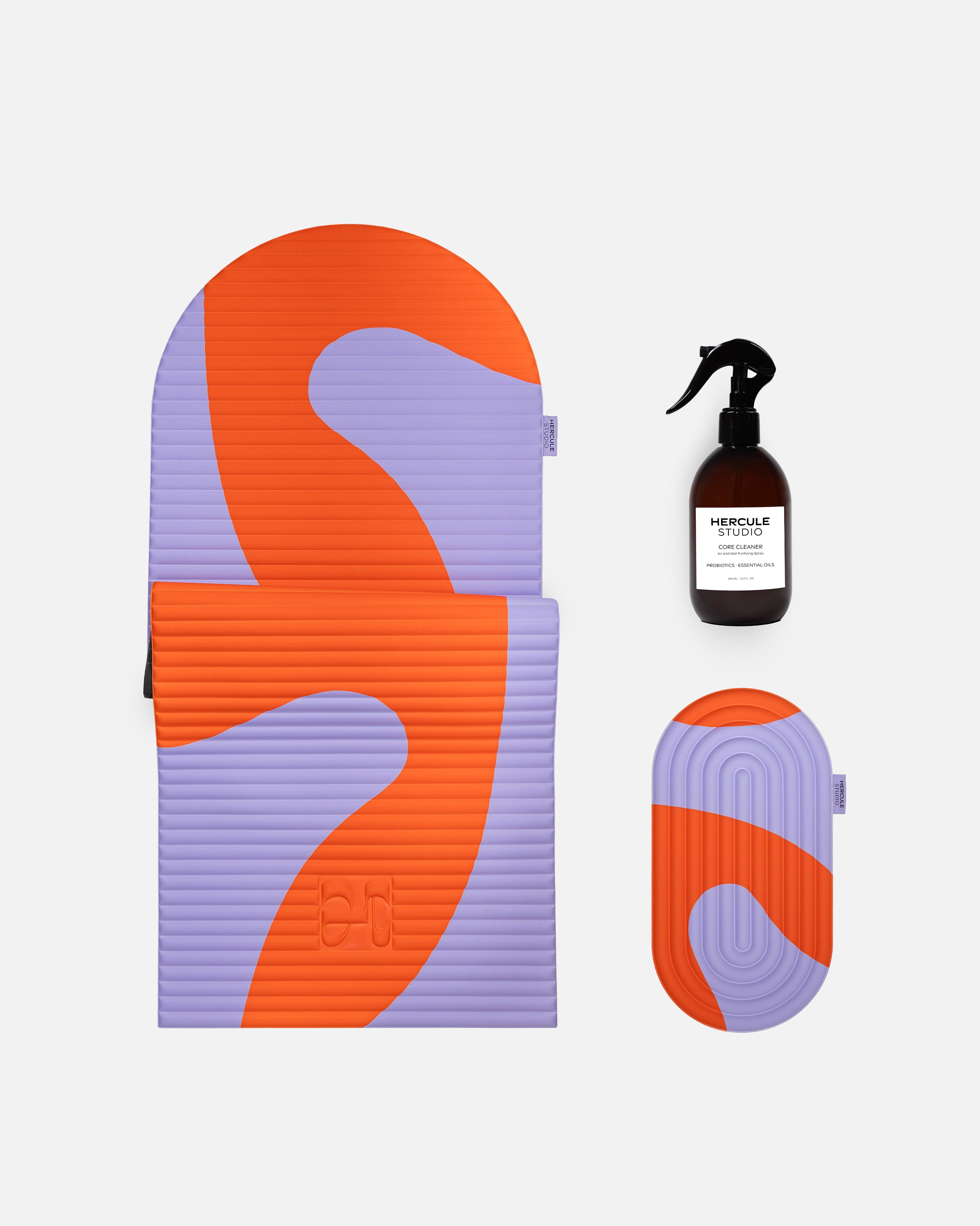 Hercule Studio Axel red orange printed essential bundle with the graphic Archy mat, the Galé 3-in-1 pad and the sport mat cleaning spray, design and responsible Pilates bundle made in France, product packshot