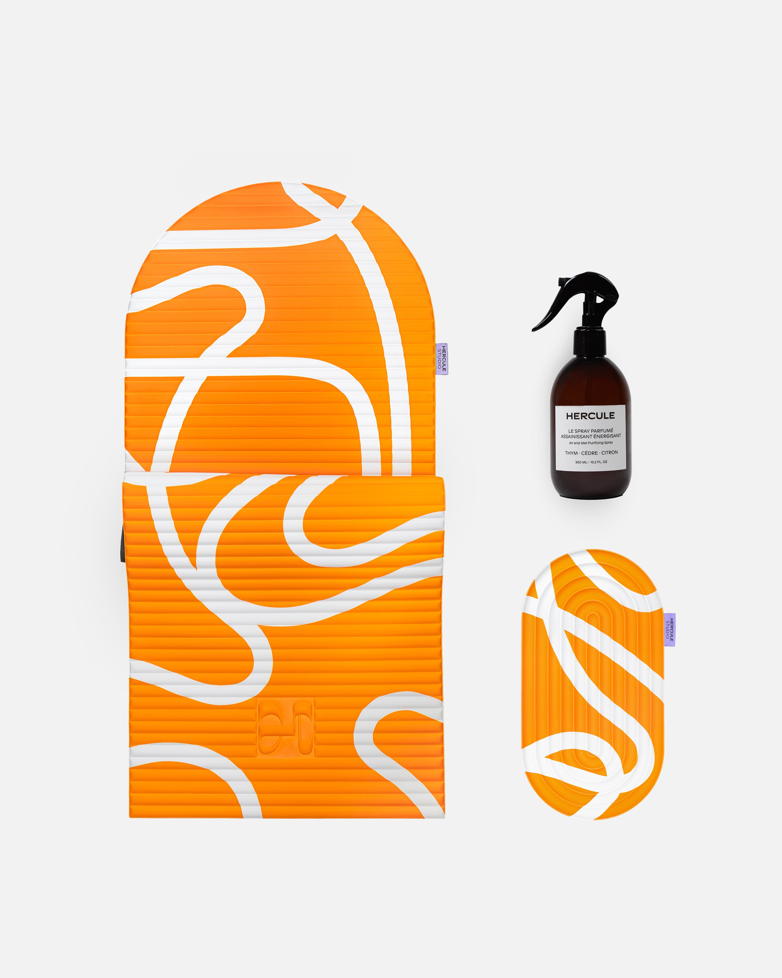 Set Confort avec Tapis de sport Archy de la marque Hercule Studio couleur Bari orange pop et mini tapis de sport Galé couleur Bari orange pop et spray parfumé assainissant pour tapis de sport photo packshot fond blanc