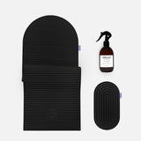 Hercule Studio Midnight Black essential sport bundle bringing together the premium Archy mat, the ergonomic Galé comfort pad and the sanitizing spray for yoga and fitness mats, complete Pilates Reformer solution Made in France, packshot view