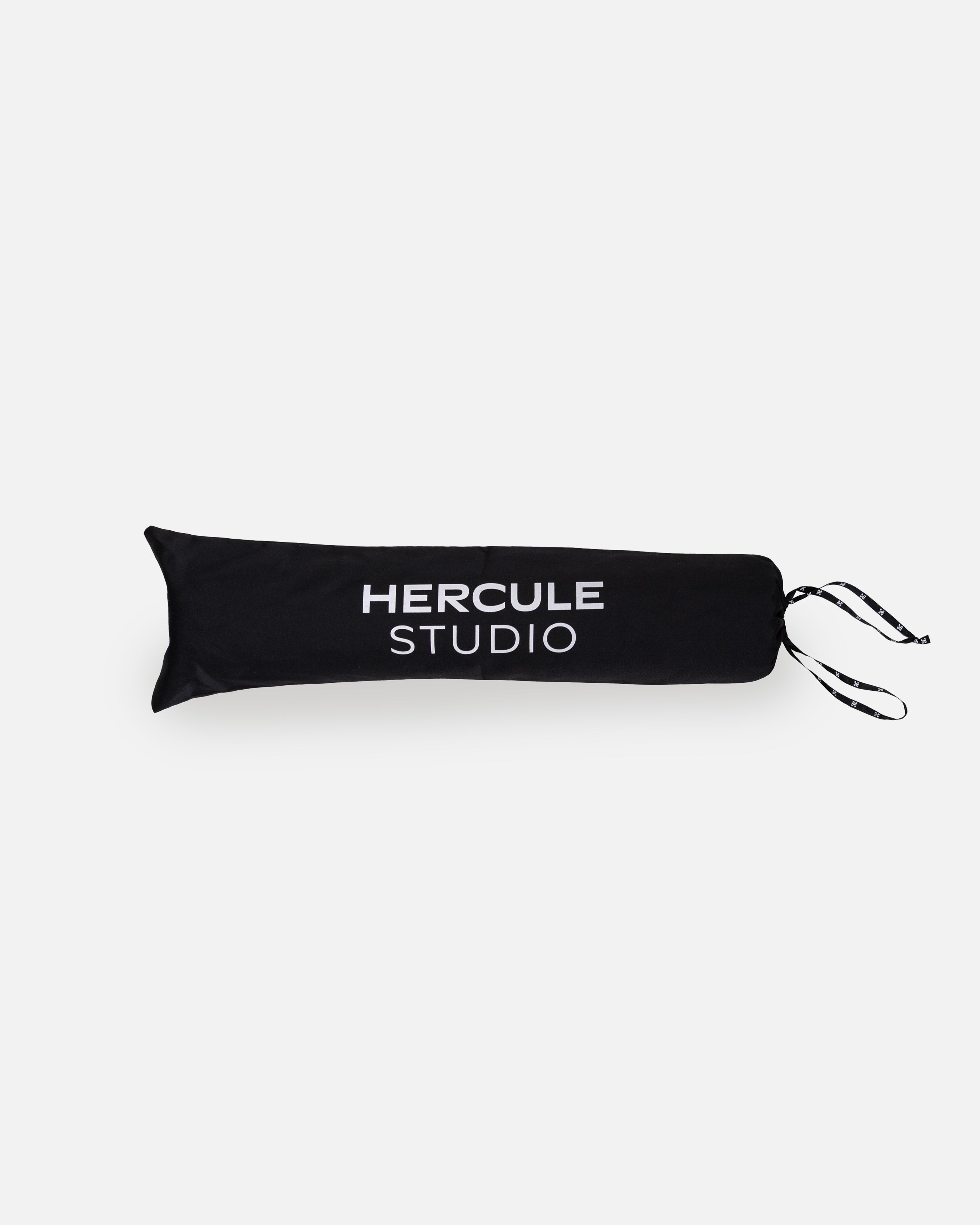 Hercule Studio black fabric dust bag, protective cover with white logo for transport and storage of the Archy sport mat