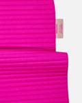 Custom Hercule Studio x From Future label detail on the Candy Pink cashmere sport mat, premium finish
