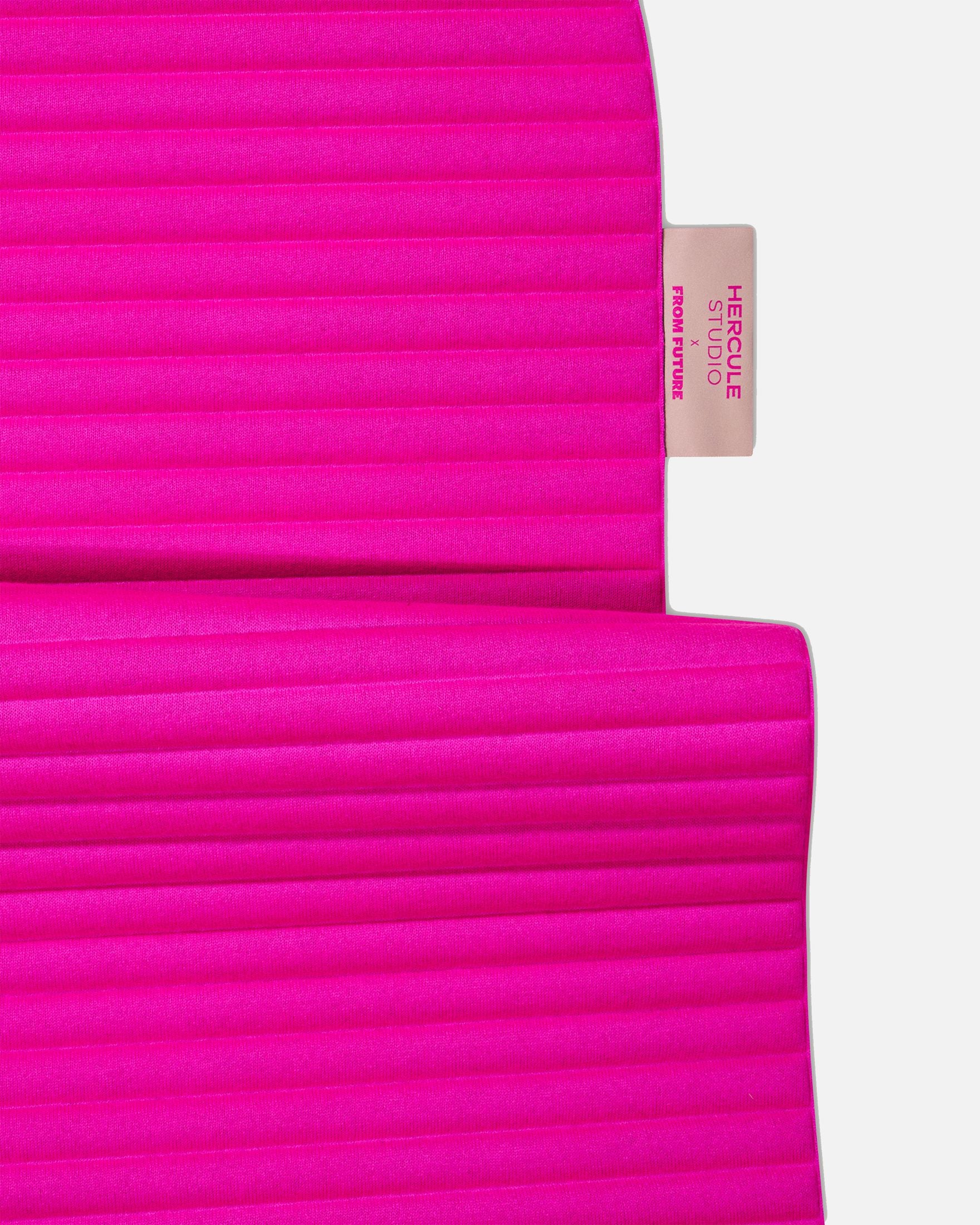 Custom Hercule Studio x From Future label detail on the Candy Pink cashmere sport mat, premium finish