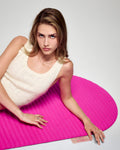 Hercule Studio x From Future Candy Pink sport mat in lifestyle session, premium fuchsia pink cashmere for Pilates and yoga, limited edition