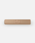 Hercule Studio Archy beige (Dune) premium sport mat, machine-washable and durable fitness mat, rolled view