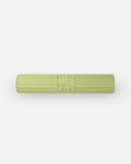 Hercule Studio Archy pistachio green premium sport mat, machine-washable and durable fitness mat, rolled view