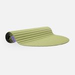 Tapis de sol pour fitness yoga et pilates de la marque hercule studio modèle archy couleur pistache packshot semi roulé