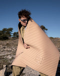 Pilates session with Hercule Studio Archy beige Dune sport mat, durable machine-washable mat made in France