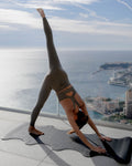 Lifestyle yoga session with the Hercule Studio Mar Midnight Black mat, premium PVC-free mat for daily yoga, timeless black tone