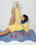 Lifestyle yoga practice with the Hercule Studio Mar Thomas Lélu mat, washable suede with motivating message for flow and meditation
