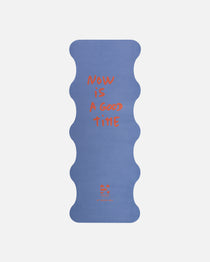 Hercule Studio Thomas Lélu quote yoga mat unrolled, blue background with red message, machine-washable suede, limited edition