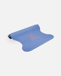 Half-rolled view of the Hercule Studio Thomas Lélu design yoga mat, limited edition quote mat, durable suede material