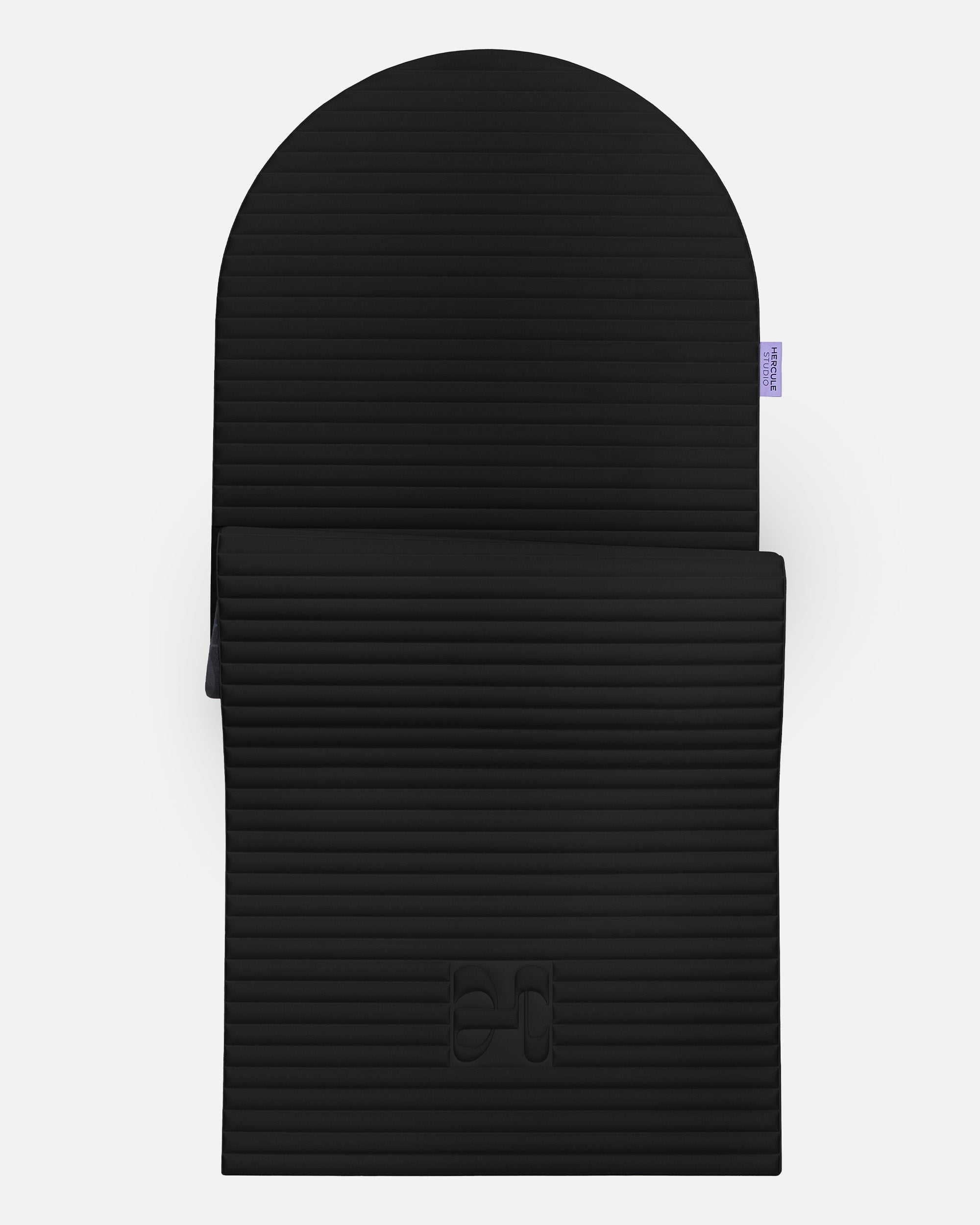 Hercule Studio Archy Midnight Black arch-shaped sport mat, durable premium Made in France design mat for fitness, Pilates and stretching, half unrolled view