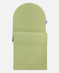 Hercule Studio Archy pistachio green arch-shaped sport mat, durable Made in France design mat for fitness, Pilates and stretching, half unrolled view