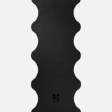 Hercule Studio Midnight Black yoga mat unrolled, natural rubber PVC-free, strong grip for vinyasa and hatha sessions