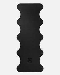 Hercule Studio Midnight Black yoga mat unrolled, natural rubber PVC-free, strong grip for vinyasa and hatha sessions