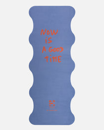 Hercule Studio Thomas Lélu quote yoga mat unrolled, blue background with red message, machine-washable suede, limited edition
