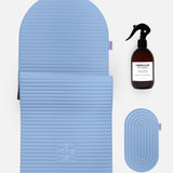 Hercule Studio blue jean essential bundle with the design Archy sport mat, the Galé 3-in-1 pad for sensitive areas and the sport mat cleaning spray, durable Made in France Pilates and fitness bundle, packshot image
