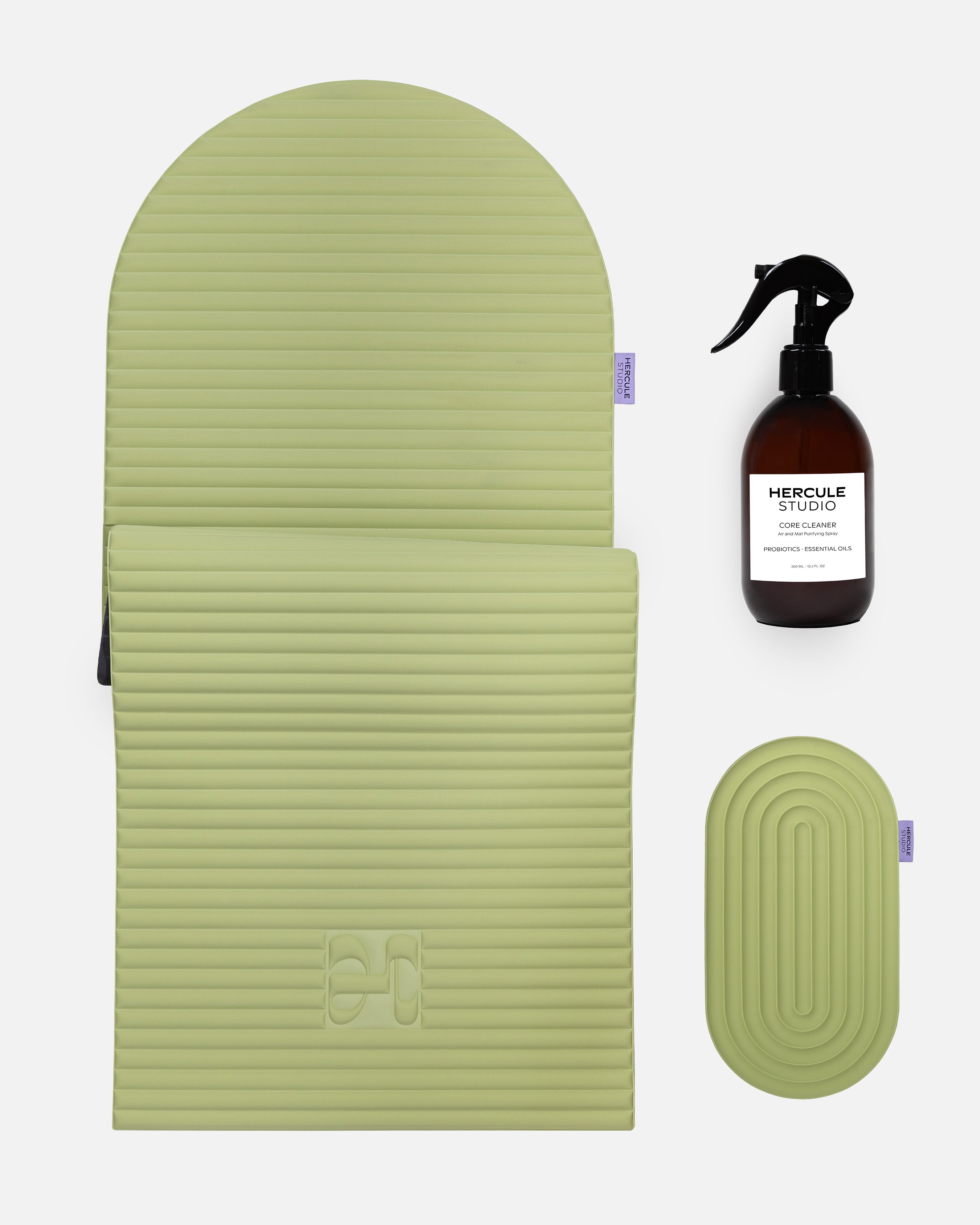 Hercule Studio pistachio green essential bundle with the ergonomic design Archy mat, the portable Galé 3-in-1 mini mat and the sport mat cleaning spray, complete Pilates and stretching bundle made in France, packshot visual